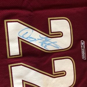 This is a Doug Flutie signed jersey.